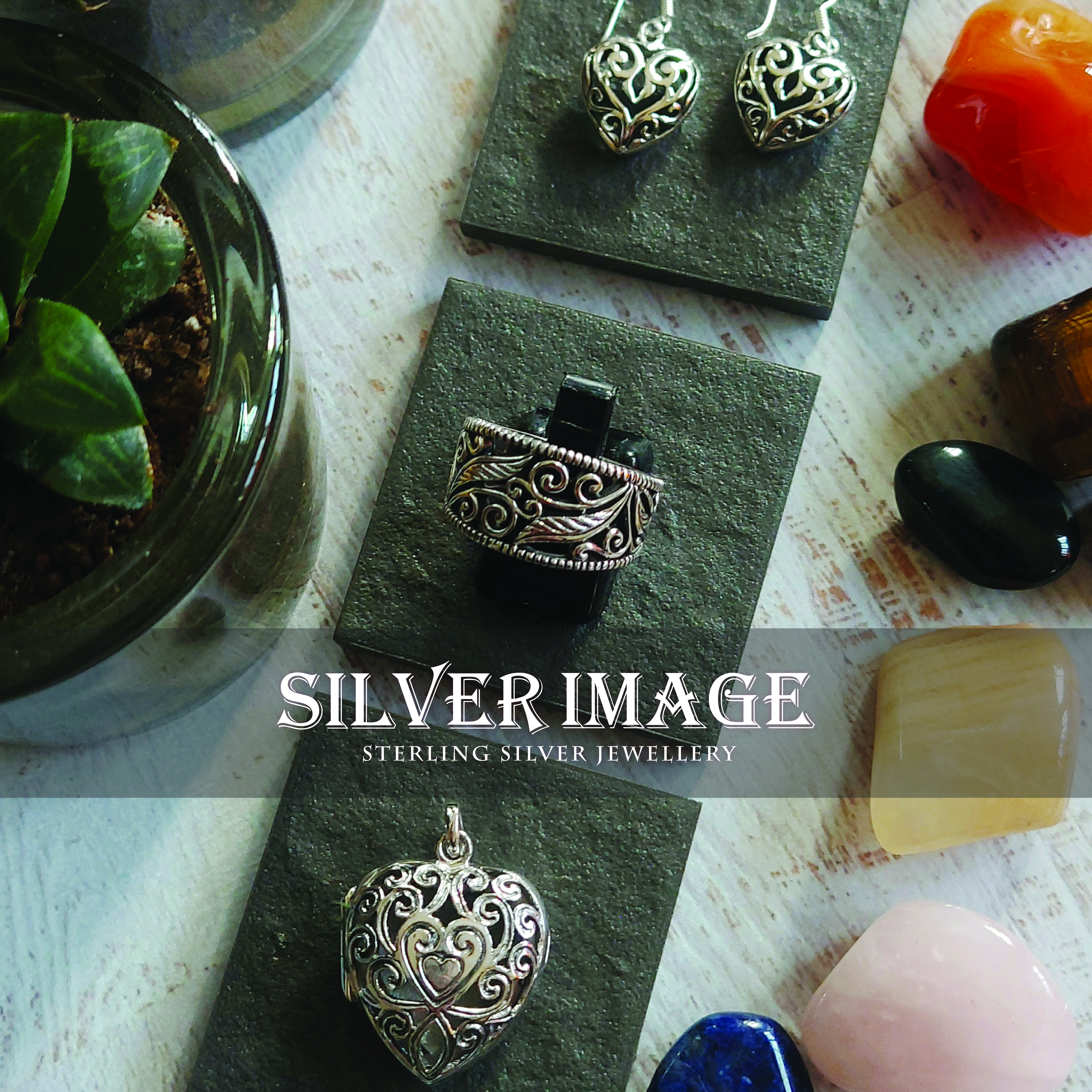 Sterling Silver Filigree Jewellery Including A Heart Locket, A Ring and Earrings