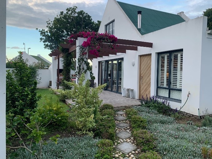 The holiday home needed a revamp. It is situated in best part of Plettenberg Bay, in a complex called Strandmeer. One has direct access to the beach and lagoon, what a pleasure!  Open plan living was the primary enhancement, with direct connections between the indoors and outdoors.