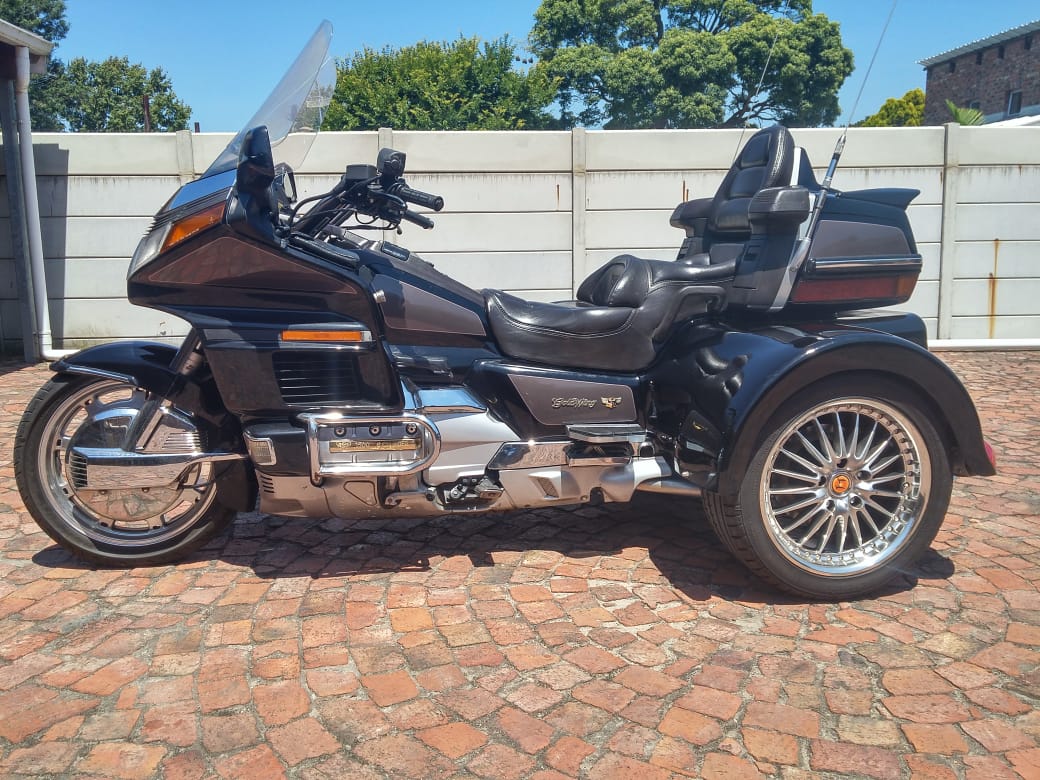 Honda Gold Wing 1500cc trike with boot, top box & reverse gear.